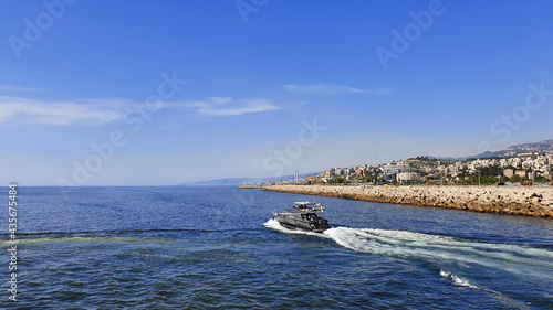 Holiday vacations. Speed motor boat cruising in the sea. Trip with family and friends. Fun © G.E.G Digital Media