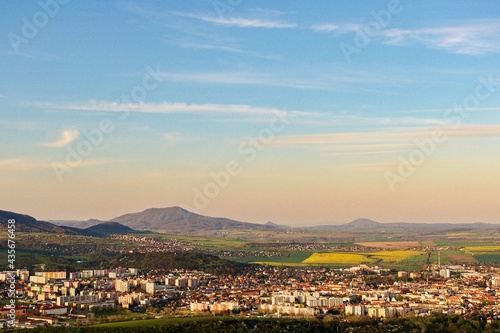 Litomerice, Czech Republic - May 08, 2021: village at sunset, vintage photo with analog noise 400 ASA