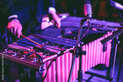 Photography Xylophone concert view of vibraphone marimba player, mallets drum sticks, with a