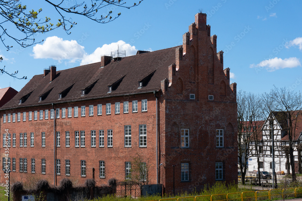 Lebork Castle was built by the Teutonic Order, presently housing the Courthouse. Characteristic elements are gothic stepped gables. Lębork, Poland. Lebork Castle was built by the Teutonic Order, presently housing the Courthouse. Characteristic elements are gothic stepped gables. Lębork, Poland.