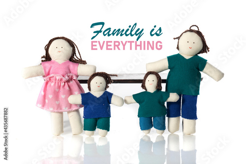 Amazing cloth family toy over white background. Multiracial family together. Parents with kids with beautiful inspirational quotes.