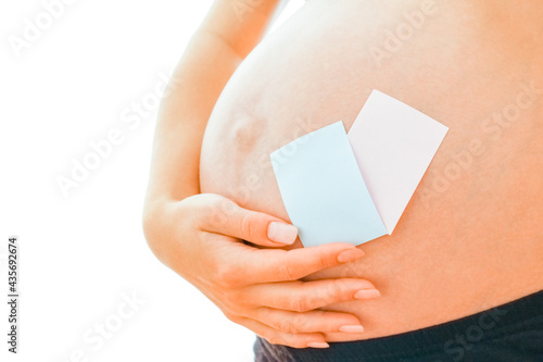 Pregnant girl on white background with stickers