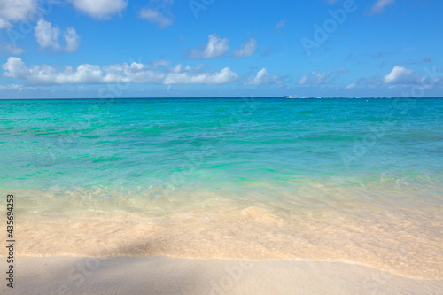 Beautiful caribbean sea and blue clouds sky.