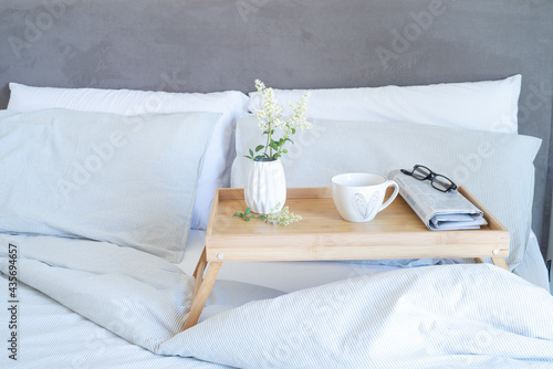 Wallpaper Mural Breakfast in bed stationery mockup scene. Cup of coffee, newspaper and glasses on tray. White vase with small flowers. Valentine's day breakfast, lifestyle concept. Torontodigital.ca