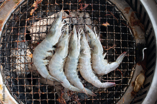Fresh shrimp on grill stove