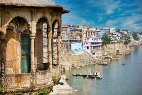 Varanasi, India: Wide angle top view of Banaras cityscape ghat next to ganges river and an Indian style dome balcony during day time in the state of Uttar Pradesh