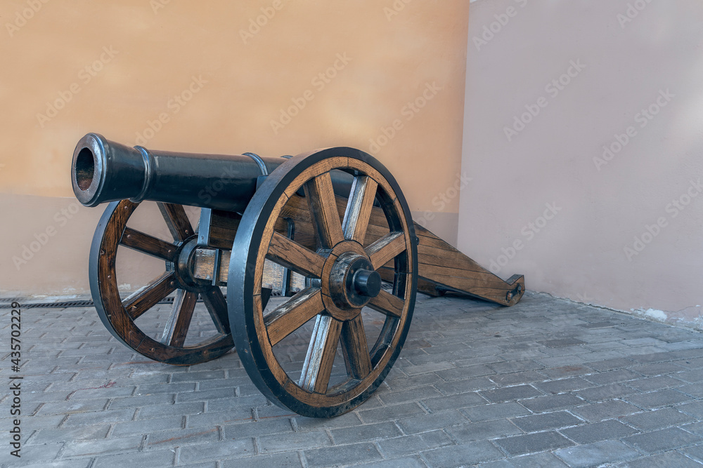 old cannon on wooden wheels in the courtyard of the cannon museum in the Russian city of Kazan