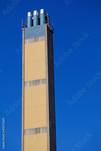 Umea, Norrland Sweden - April 22, 2021: high chimney seen from the side near the university photo