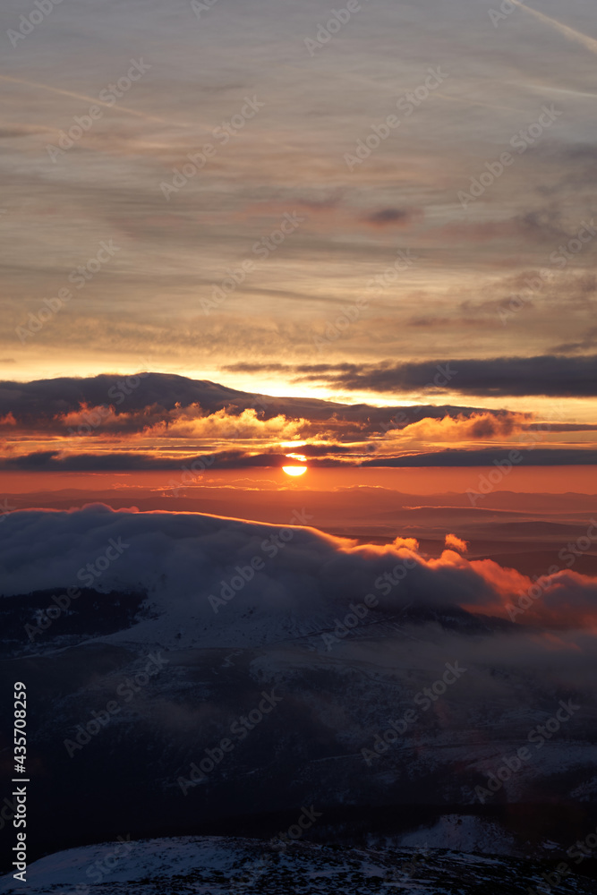 clouds and mountain at sunset