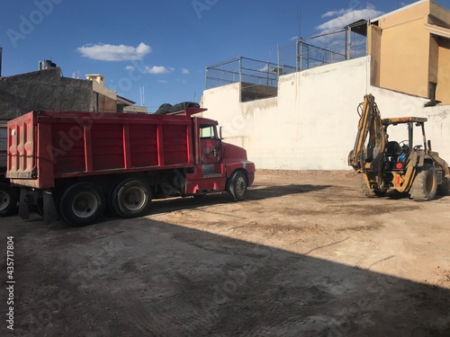 white and red dump truck  photo