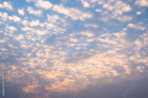 White cloudy with a blue sky.Wave clouds on the sky.Fluffy cloud and sunset.