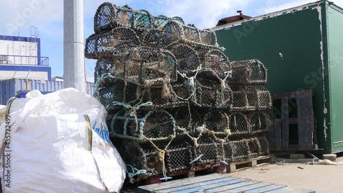 Fishing boats and equipment at Redcastle Harbour Donegal photo