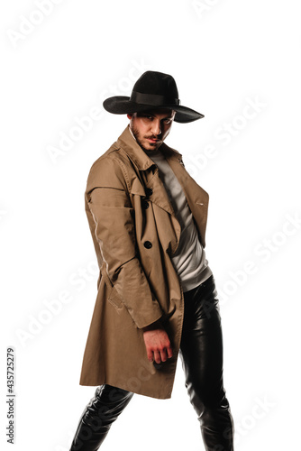 Trendy young guy with cowboy hat