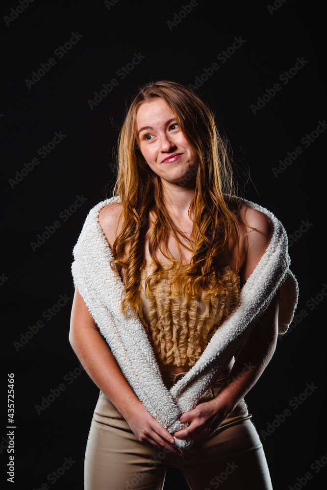Fashionable young woman, studio fashion shot Fashionable young woman, studio fashion shot
