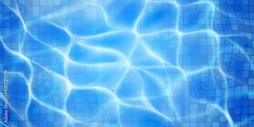 Swimming pool background with mosaic tiles, sunlight glares and caustic ripples. Top view of the water surface. In light blue colors