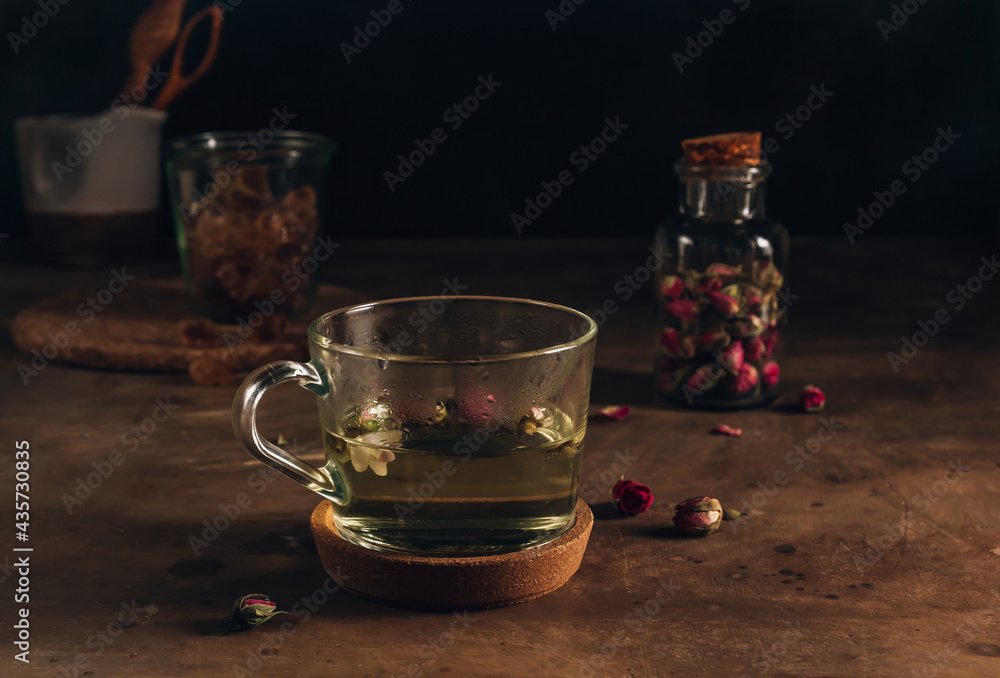 Rose tea on dark background. Selective focus Rose tea on dark background. Selective focus