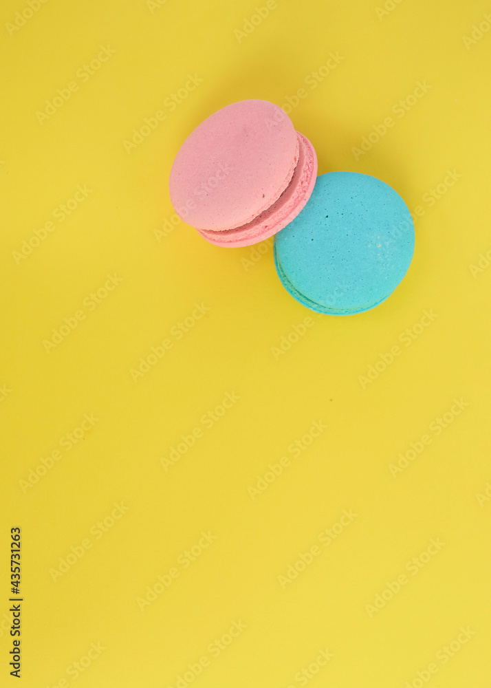 French macaroon biscuits on colorful background French macaroon biscuits on colorful background