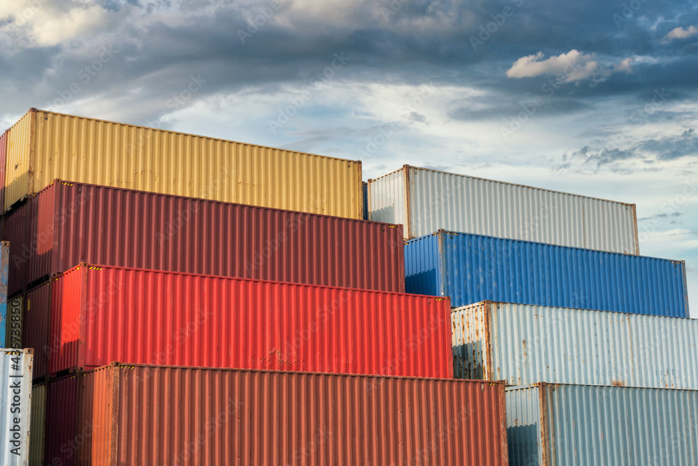 Stack of Containers Cargo Ship Import/Export in Harbor Port, Cargo Freight Shipping of Container Logistics Industry. Nautical Transport Distribution Yard, Business Commercial Dock and Transportation. Stack of Containers Cargo Ship Import/Export in Harbor Port, Cargo Freight Shipping of Container Logistics Industry. Nautical Transport Distribution Yard, Business Commercial Dock and Transportation.
