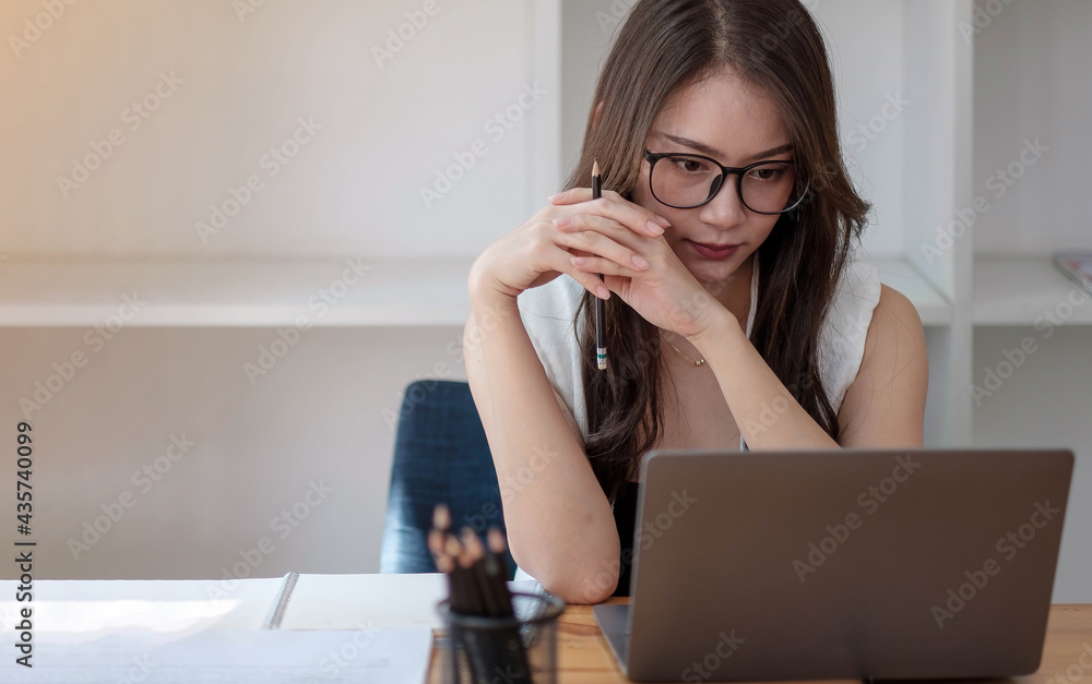 Portrait of attractive asian business woman working with laptop computer for group online meeting conference, Portrait of attractive asian business woman working with laptop computer for group online meeting conference,