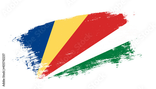 Flag of Seychelles country on brush paint stroke trail view. Elegant texture of national country flag