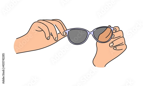 Hand holding eyeglasses vector illustration
