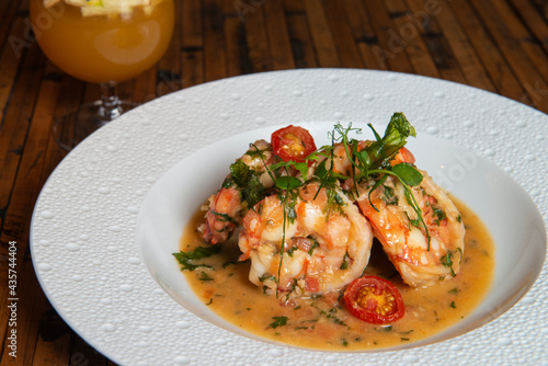 Shrimp and grits with chorizo cream sauce
