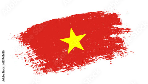 Flag of Vietnam country on brush paint stroke trail view. Elegant texture of national country flag