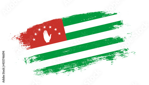 Flag of Abkhazia country on brush paint stroke trail view. Elegant texture of national country flag
