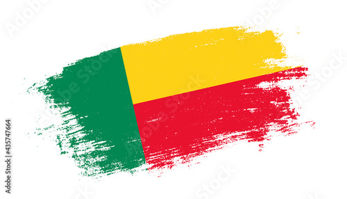 Flag of Benin country on brush paint stroke trail view. Elegant texture of national country flag