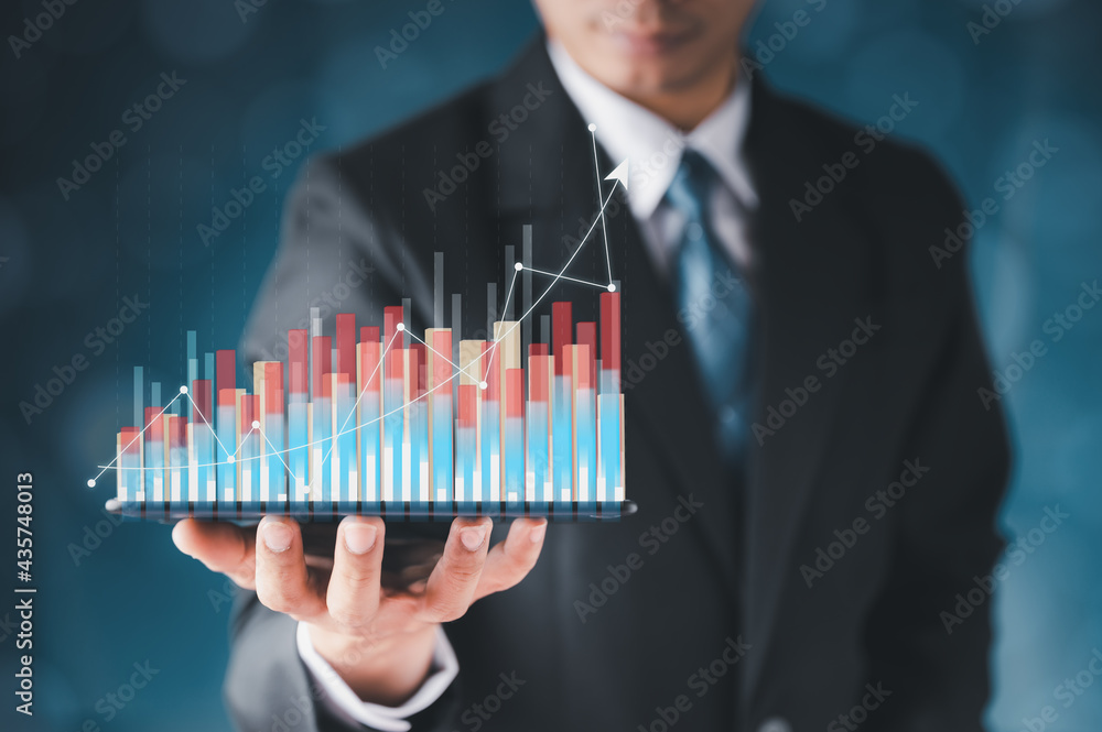 Businessman hand show Stock chart showing rising stock sign with graph ...