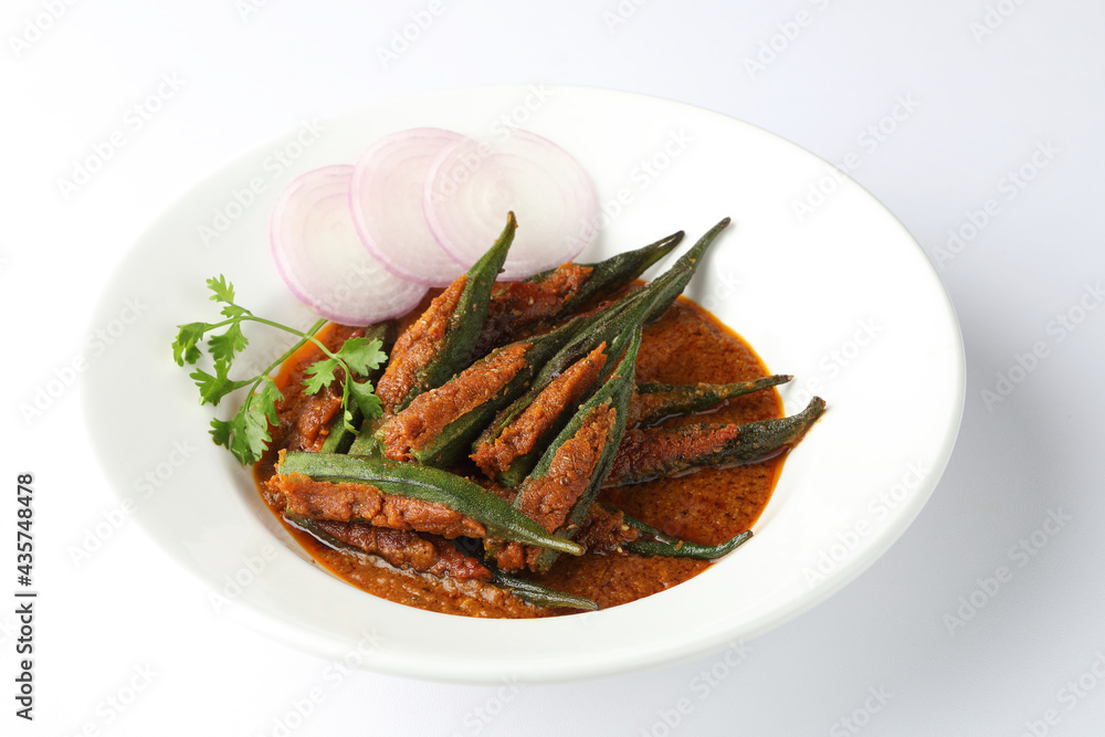 Indian masala fried bhindi or ladyfinger, curry, Served with chapatti, roti, naan, poori
Indian masala fried bhindi or ladyfinger, curry, Served with chapatti, roti, naan, poori
