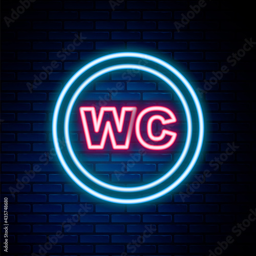 Glowing neon line Toilet icon isolated on brick wall background. WC sign. Washroom. Colorful outline concept. Vector