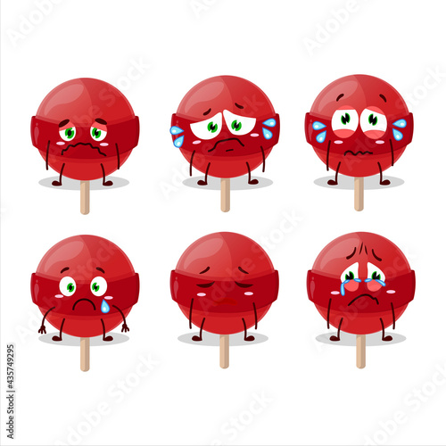 Red lolipop cartoon character with sad expression