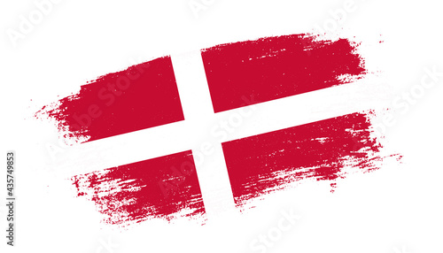 Flag of Denmark country on brush paint stroke trail view. Elegant texture of national country flag