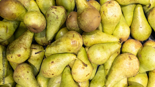 fruit green pears yellow background in market for sale and natural wallpaper