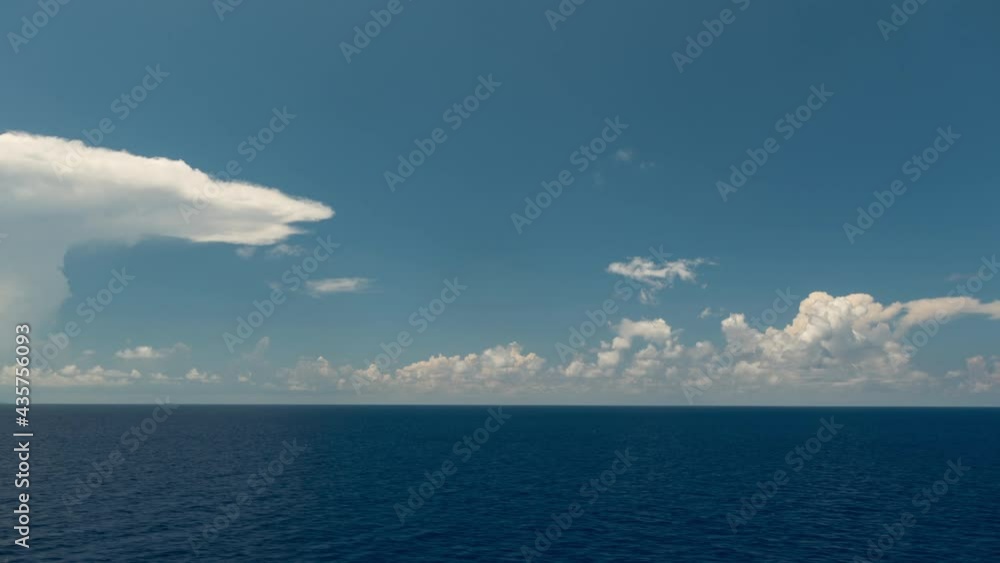 Clouds rising over the ocean from a boat Clouds rising over the ocean from a boat