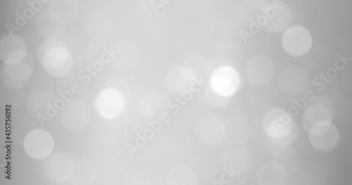 White Background with light bokeh and space for the text, Silver background, in soft blur style.