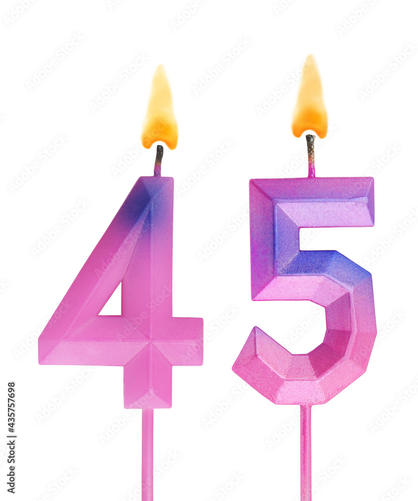 Pink and blue burning birthday candles isolated on white background, number 45 Pink and blue burning birthday candles isolated on white background, number 45