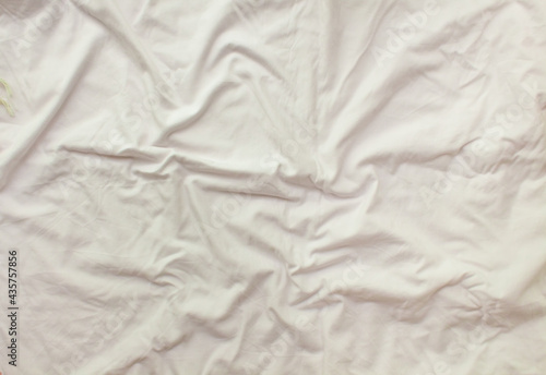 Flat layout white background. Modern minimal background with fabric texture and folds of cotton fabric. Top view