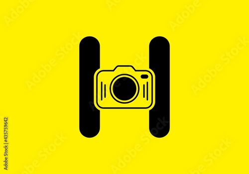 Black yellow of initial H letter with camera