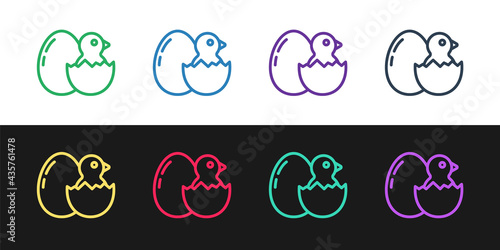 Set line Little chick in cracked egg icon isolated on black and white background. Vector