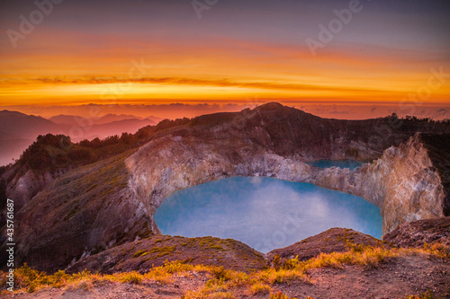 Fototapeta Naklejka Na Ścianę i Meble -  Sunrise at Kelimutu Lake on Mount Kelimutu Flores	