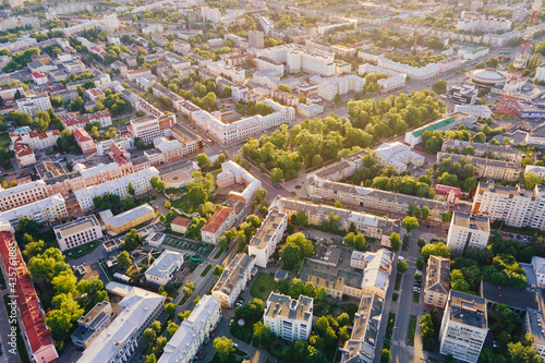 Cityscape of Gomel, Belarus. Aerial view of town architecture. City streets at sunset, bird eye view photo