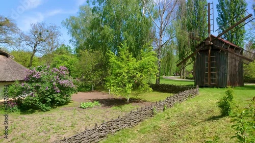 Panorama with windmill and old hata house, Pereiaslav Scansen, Ukraine photo