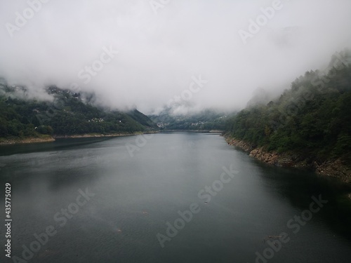 fog over a lake in the mountains