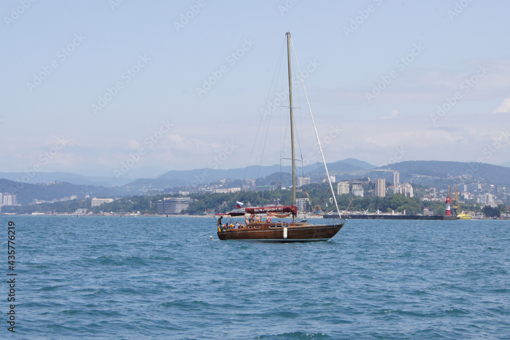 small motor boat or yachts sailing on the sea small motor boat or yachts sailing on the sea