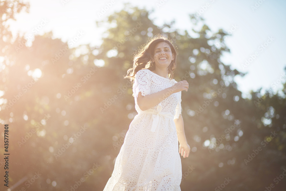 Happy middle-age woman in nature. Happy middle-age woman in nature.