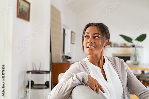 Pensive mature woman at home