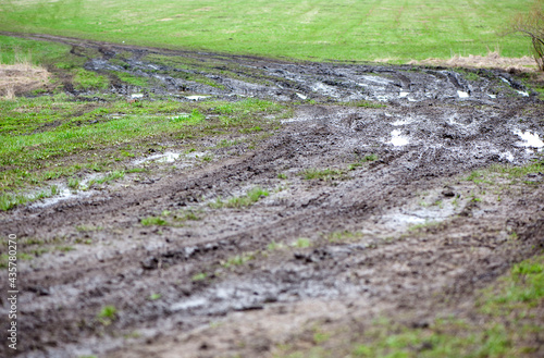 Obraz na plátne countryside landscape with a muddy road. Off road trips