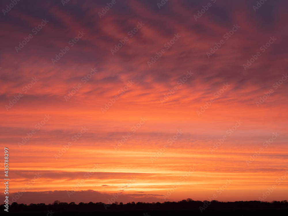 Golden sunset sky in Dutch landscape